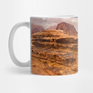 Rock formation with natural arch in the Wadi Rum desert, Jordan Mug